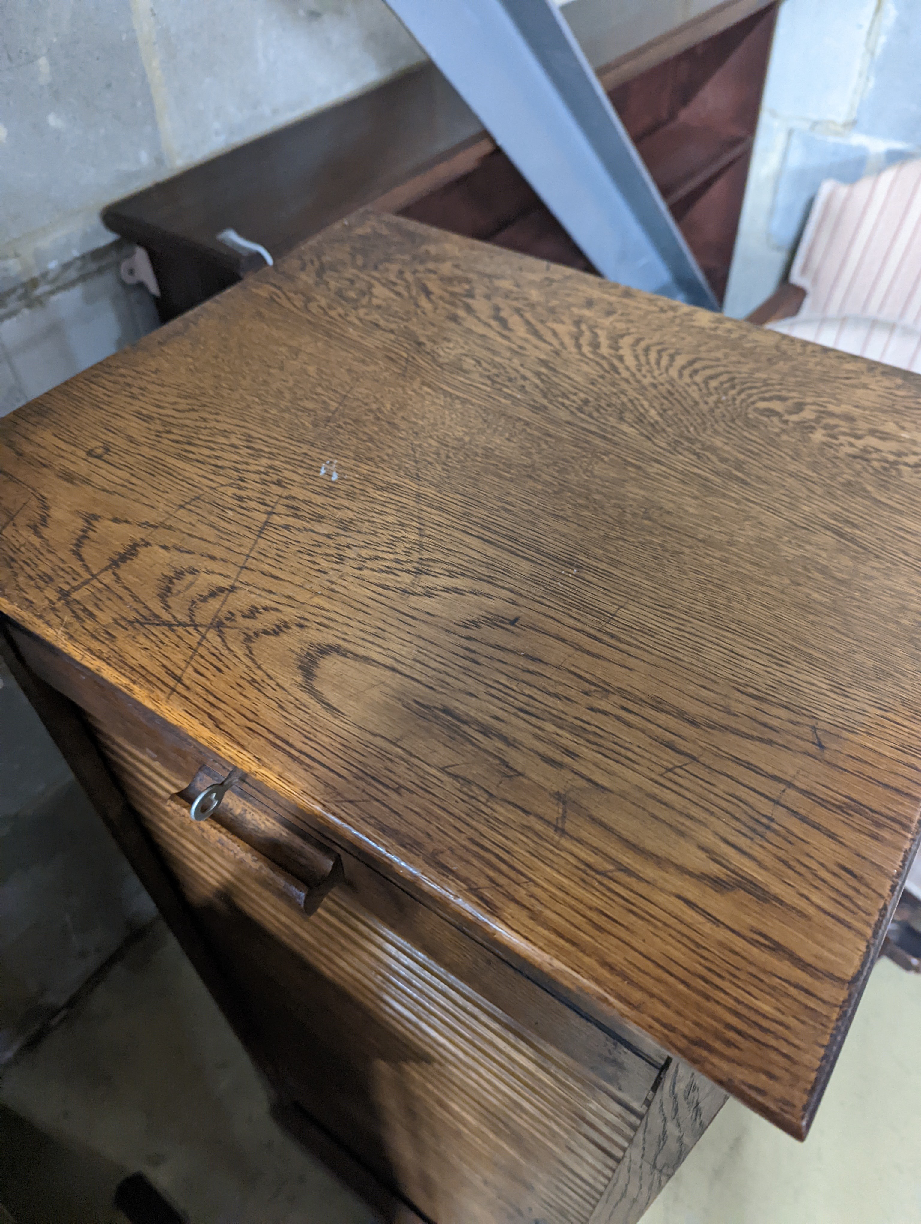 An early 20th century oak tambour filing cabinet, width 49cm, depth 40cm, height 125cm